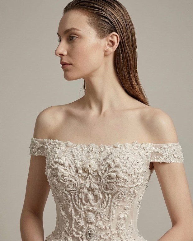 Hand-embroidered off-shoulder bodice
